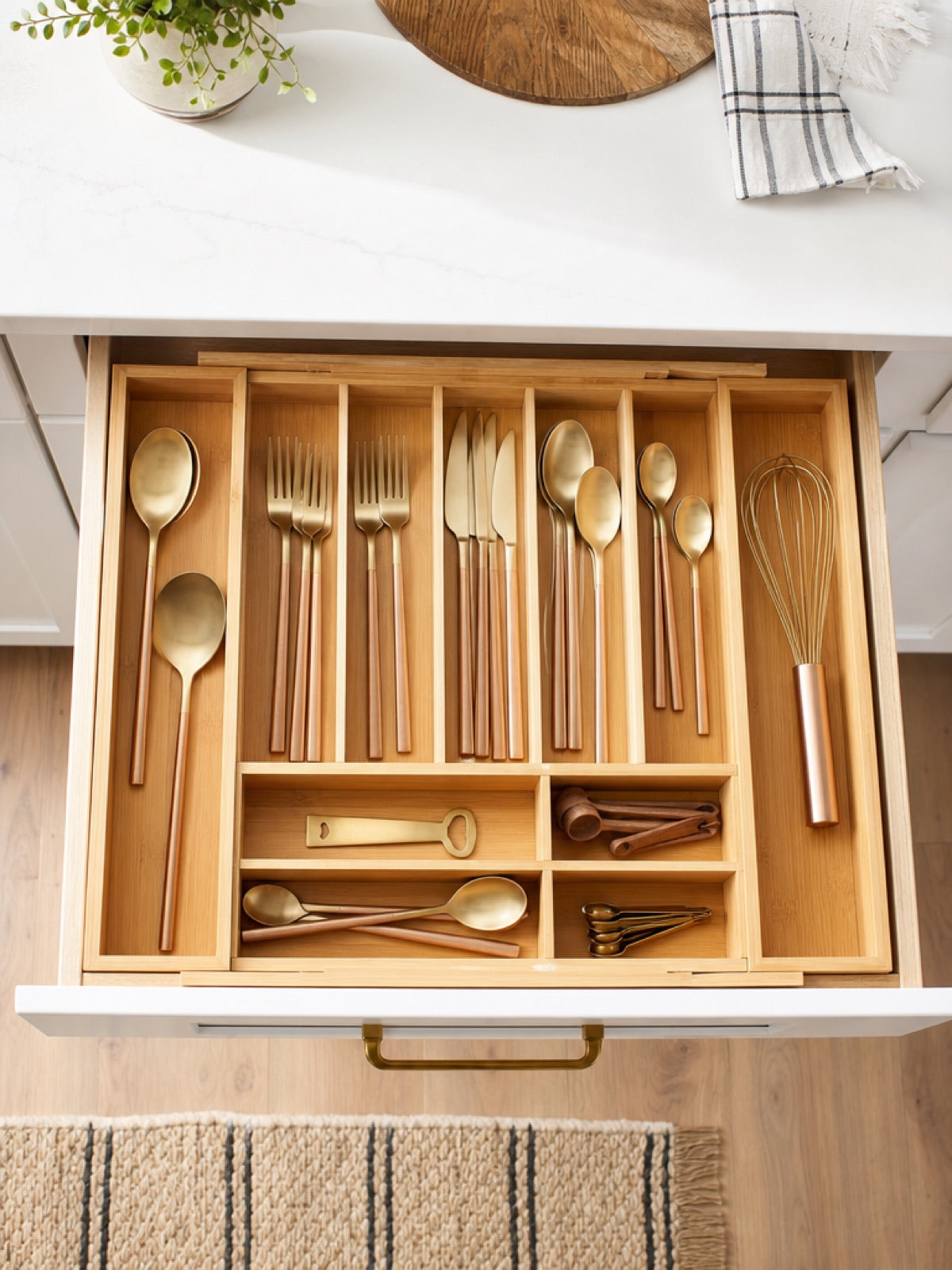 Bamboo Expandable Kitchen Drawer Organizer in use - Miraclli
